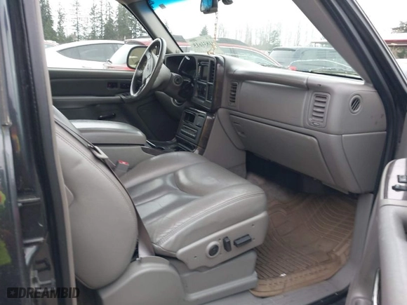 2003 GMC Yukon Denali with VIN 1GKEK63U73J310098, listed as a IAAI auction lot 41831615 with 262,134 mi miles. Bid and sale history available at carsss.com. Image 5.
