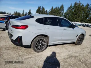 2023 BMW X4 M40i with VIN 5UX43DT00P9R86047, listed as a Copart auction lot 47321295 with 21,640 mi miles and Salvage title. Bid and sale history available at DreamBid. Image 3.