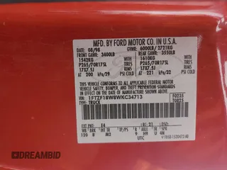 1998 Ford F-150 with VIN 1FTZF18W8WKC34713, listed as a Copart auction lot 50933355 with 237,940 mi miles and Salvage title. Bid and sale history available at DreamBid. Image 12.