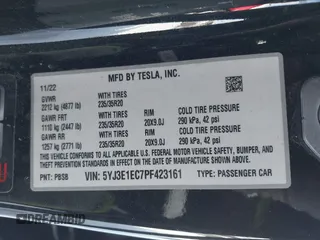 2023 Tesla Model 3 Performance with VIN 5YJ3E1EC7PF423161, listed as a IAAI auction lot 41566987 with 22,111 mi miles. Bid and sale history available at carsss.com. Image 9.