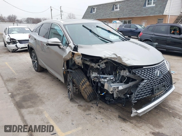 2021 Lexus RX with VIN 2T2HZMDA4MC305057, listed as a IAAI auction lot 41706486 with 37,518 mi miles. Bid and sale history available at carsss.com. Image 1.