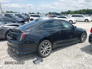 2020 Cadillac CT5 Sport z VIN 1G6DP5RK7L0154923, wystawiony jako IAAI lot #42177217 z przebiegiem 57 329 mil mil oraz . Historia ofert i sprzedaży dostępna na DreamBid. Obrazek 14.