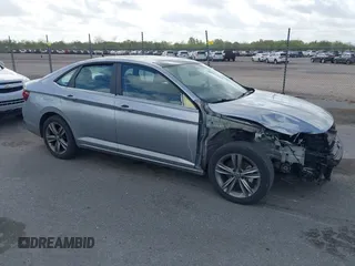 2023 Volkswagen Jetta SE z VIN 3VW7M7BU2PM056005, wystawiony jako IAAI lot #41768826 z przebiegiem 33 838 mil mil oraz . Historia ofert i sprzedaży dostępna na DreamBid. Obrazek 14.