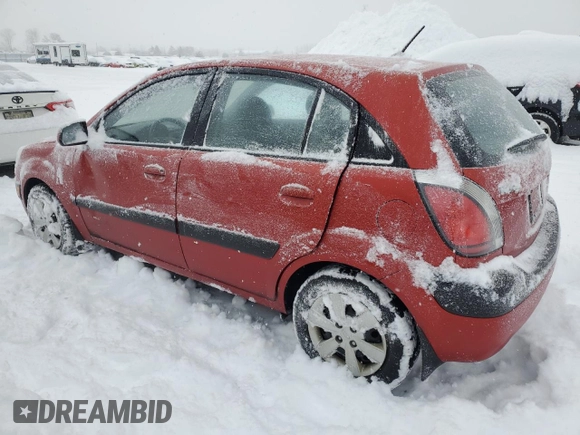 2009 Kia Rio LX with VIN KNADE243596480661, listed as a Copart auction lot 87673065 with 128,733 mi miles and Clean Title. Bid and sale history available at carsss.com. Image 2.
