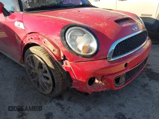 2013 MINI Convertible S with VIN WMWZP3C55DT705938, listed as a IAAI auction lot 41372294 with 118,481 mi miles and . Bid and sale history available at DreamBid. Image 6.