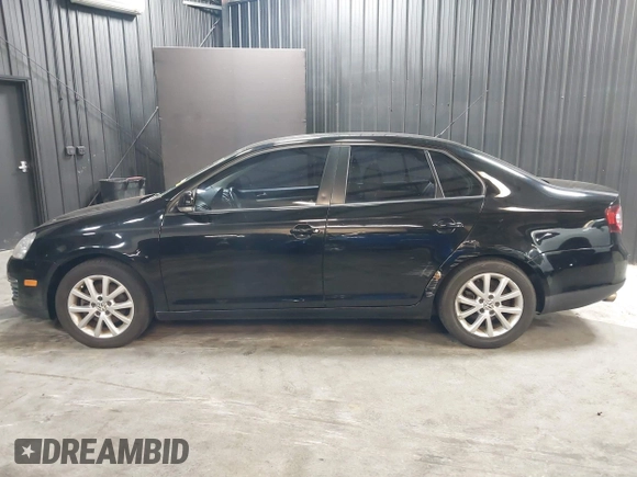 2010 Volkswagen Jetta SE z VIN 3VWRZ7AJ3AM157188, wystawiony jako IAAI lot #41816829 z przebiegiem 188 180 mil mil oraz . Historia ofert i sprzedaży dostępna na DreamBid. Obrazek 14.