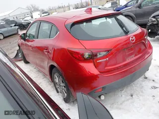 2016 Mazda Mazda3 i Grand Touring with VIN 3MZBM1N77GM245567, listed as a IAAI auction lot 41330883 with 128,423 mi miles. Bid and sale history available at carsss.com. Image 3.