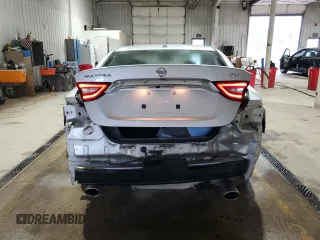 2017 Nissan Maxima SV z VIN 1N4AA6AP5HC388195, wystawiony jako Copart lot #57594715 z przebiegiem 35 760 mil mil oraz Szkoda całkowita • Salvage title. Historia ofert i sprzedaży dostępna na DreamBid. Obrazek 6.