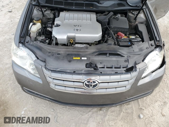2007 Toyota Avalon XL z VIN 4T1BK36B67U191919, wystawiony jako Copart lot #56274055 z przebiegiem 188 679 mil mil oraz Szkoda całkowita • Salvage title. Historia ofert i sprzedaży dostępna na DreamBid. Obrazek 11.