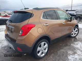 2016 Buick Encore Leather with VIN KL4CJCSB0GB571295, listed as a IAAI auction lot 41121647 with 30,936 mi miles. Bid and sale history available at carsss.com. Image 4.