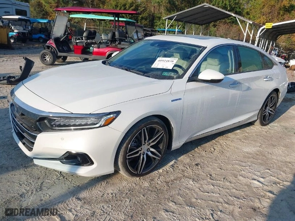 2022 Honda Accord Hybrid Touring with VIN 1HGCV3F94NA000205, listed as a IAAI auction lot 40924838 with 65,516 mi miles. Bid and sale history available at carsss.com. Image 2.