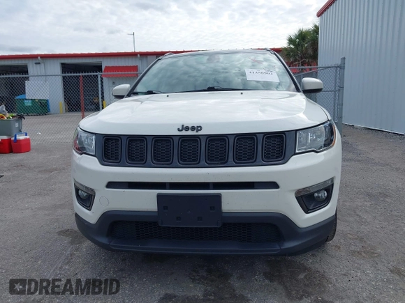 2018 Jeep Compass Latitude with VIN 3C4NJCBB1JT408465, listed as a IAAI auction lot 41350902 with 79,565 mi miles and . Bid and sale history available at DreamBid. Image 12.