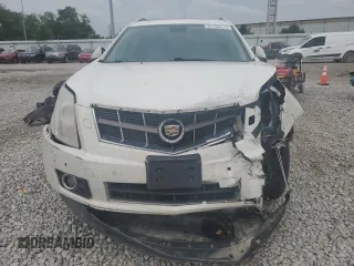 2012 Cadillac SRX Performance Collection z VIN 3GYFNBE32CS615988, wystawiony jako Copart lot #61198415 z przebiegiem 156 135 mil mil oraz Szkoda całkowita • Salvage title. Historia ofert i sprzedaży dostępna na DreamBid. Obrazek 5.