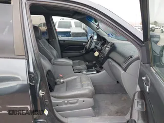 2006 Acura MDX Touring w/Navi with VIN 2HNYD18876H523408, listed as a IAAI auction lot 41756670 with 219,796 mi miles. Bid and sale history available at carsss.com. Image 5.