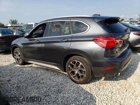 2021 BMW X1 xDrive28i with VIN WBXJG9C09M5T96327, listed as a Copart auction lot 49876493 with 42,572 mi miles and . Bid and sale history available at DreamBid. Image 2.