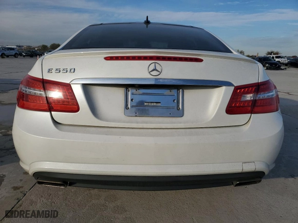 2011 Mercedes-Benz E-Class E 550 with VIN WDDKJ7CBXBF077136, listed as a Copart auction lot 83542054 with 125,274 mi miles and Salvage Title. Bid and sale history available at carsss.com. Image 6.