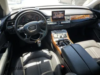 2018 Audi A8 z VIN WAU44AFD0JN000880, wystawiony jako Copart lot #54751235 z przebiegiem 76 161 mil mil oraz Szkody całkowita. Historia ofert i sprzedaży dostępna na DreamBid. Obrazek 8.