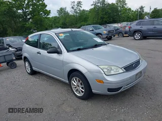 2005 Ford Focus S z VIN 3FAFP31N65R108413, wystawiony jako IAAI lot #42347562 z przebiegiem 156 291 mil mil oraz . Historia ofert i sprzedaży dostępna na DreamBid. Obrazek 1.