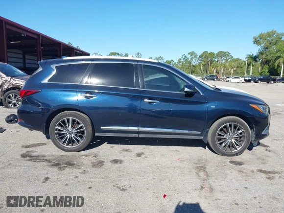 2016 Infiniti QX60 with VIN 5N1AL0MN4GC532048, listed as a IAAI auction lot 41832885 with 125,306 mi miles and . Bid and sale history available at DreamBid. Image 13.
