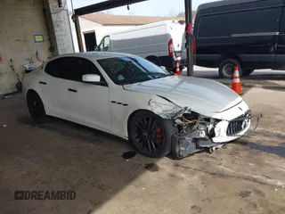 2015 Maserati Ghibli z VIN ZAM57XSA9F1141342, wystawiony jako IAAI lot #42118941 z przebiegiem 77 473 mil mil oraz . Historia ofert i sprzedaży dostępna na DreamBid. Obrazek 1.