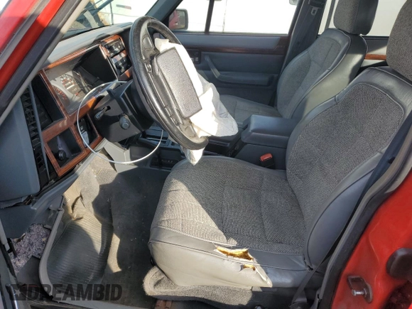 1996 Jeep Cherokee Country with VIN 1J4FJ78S5TL287631, listed as a Copart auction lot 79755834 with 195,365 mi miles and Salvage Title. Bid and sale history available at carsss.com. Image 7.