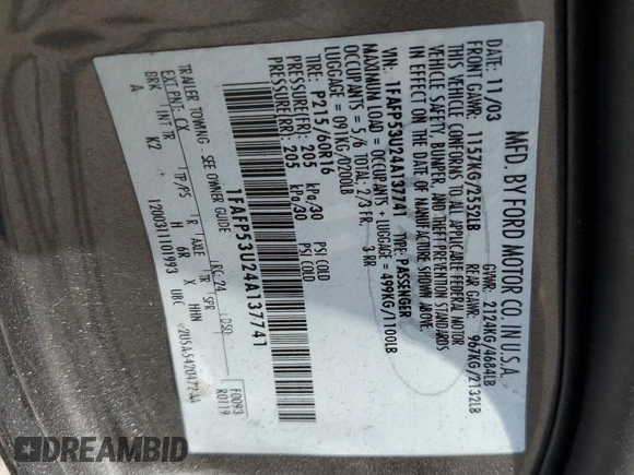 2004 Ford Taurus SE with VIN 1FAFP53U24A137741, listed as a Copart auction lot 54313915 with 92,739 mi miles and Salvage Title. Bid and sale history available at DreamBid. Image 13.