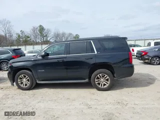 2016 Chevrolet Tahoe LT with VIN 1GNSCBKCXGR100381, listed as a IAAI auction lot 41542315 with 228,506 mi miles. Bid and sale history available at carsss.com. Image 14.