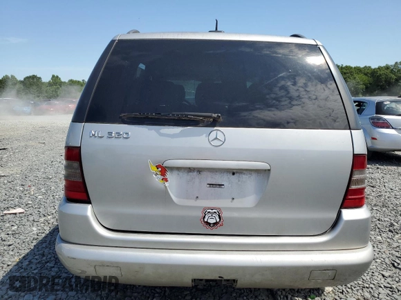2001 Mercedes-Benz M-Class with VIN 4JGAB54EX1A271687, listed as a Copart auction lot 57046944 with 209,561 mi miles and Salvage Title. Bid and sale history available at carsss.com. Image 6.