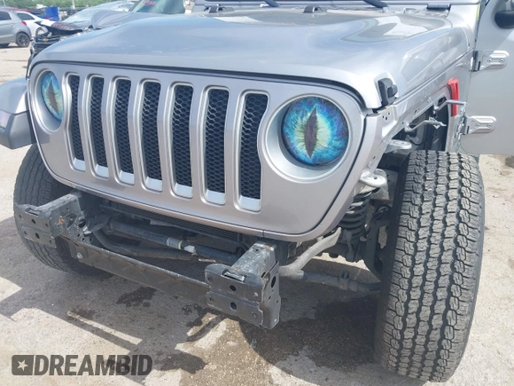 2018 Jeep Wrangler Unlimited Sahara with VIN 1C4HJXEG4JW115522, listed as a IAAI auction lot 42322791 with 68,409 mi miles and . Bid and sale history available at DreamBid. Image 6.