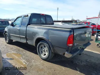 2003 Ford F-150 XL with VIN 1FTRX17W53NB00671, listed as a IAAI auction lot 41576739 with 194,066 mi miles. Bid and sale history available at carsss.com. Image 3.