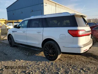 2021 Lincoln Navigator Black Label z VIN 5LMJJ3TT5MEL00238, wystawiony jako Copart lot #76951964 z przebiegiem 69 712 mil mil oraz Szkoda całkowita • Salvage title. Historia ofert i sprzedaży dostępna na DreamBid. Obrazek 2.