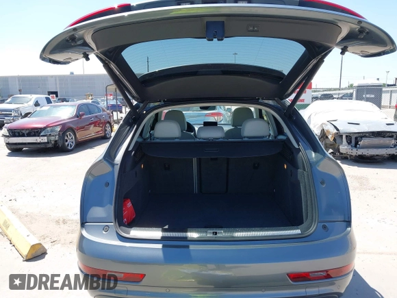 2015 Audi Q3 Prestige with VIN WA1GFCFS7FR013818, listed as a IAAI auction lot 41975076 with 60,295 mi miles and . Bid and sale history available at DreamBid. Image 18.