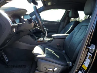 2021 BMW X4 M40i с VIN 5UX2V5C01M9F24036, выставлен на аукционе Copart как лот 74834364 с пробегом 38 185 миль миль и Списание • Salvage title. История ставок и продаж доступна на DreamBid. Изображение 7.