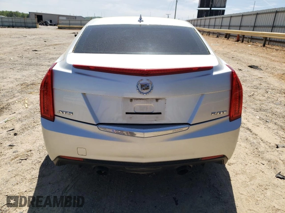 2014 Cadillac ATS Standard RWD z VIN 1G6AA5RX1E0167721, wystawiony jako Copart lot #53982705 z przebiegiem 160 328 mil mil oraz Szkoda całkowita • Salvage title. Historia ofert i sprzedaży dostępna na DreamBid. Obrazek 6.