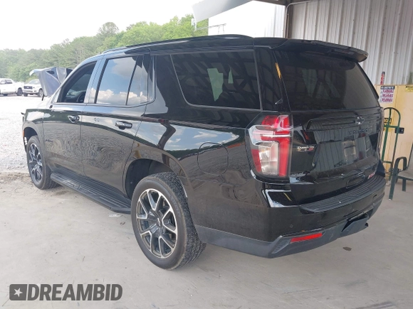2023 Chevrolet Tahoe RST with VIN 1GNSCRKD2PR531394, listed as a IAAI auction lot 42147801 with 23,423 mi miles and . Bid and sale history available at DreamBid. Image 3.
