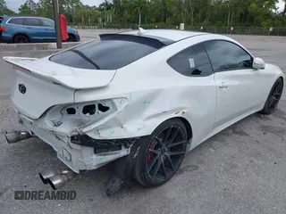 2013 Hyundai Genesis Coupe R-Spec with VIN KMHHU6KJ2DU108081, listed as a IAAI auction lot 41650433 with 80,964 mi miles and . Bid and sale history available at DreamBid. Image 4.