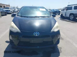 2012 Toyota Prius c One with VIN JTDKDTB36C1527223, listed as a IAAI auction lot 42002927 with 138,176 mi miles. Bid and sale history available at carsss.com. Image 12.