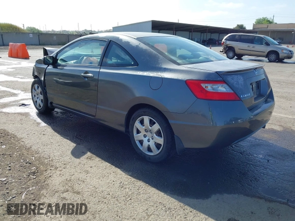 2009 Honda Civic Cpe LX with VIN 2HGFG12699H540664, listed as a IAAI auction lot 42100966 with Not Provided miles. Bid and sale history available at carsss.com. Image 3.