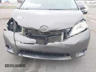 2011 Toyota Sienna LE AAS with VIN 5TDKK3DC3BS077857, listed as a IAAI auction lot 42099175 with 283,777 mi miles and . Bid and sale history available at DreamBid. Image 6.