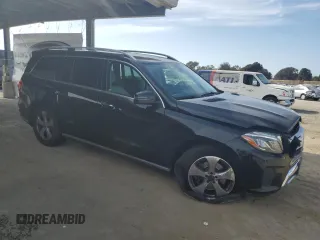 2018 Mercedes-Benz GLS with VIN 4JGDF6EE2JB076621, listed as a Copart auction lot 54197195 with 66,493 mi miles and Salvage Title. Bid and sale history available at carsss.com. Image 4.