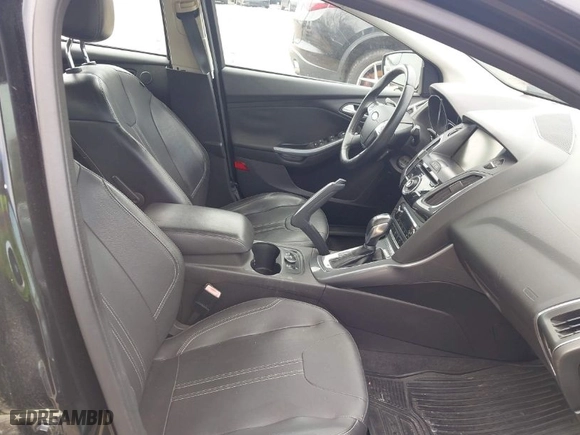 2012 Ford Focus Titanium with VIN 1FAHP3J2XCL369554, listed as a IAAI auction lot 42072931 with 95,474 mi miles. Bid and sale history available at carsss.com. Image 5.