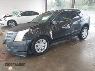 2011 Cadillac SRX Luxury Collection z VIN 3GYFNAEY4BS655011, wystawiony jako IAAI lot #41990104 z przebiegiem 133 246 mil mil oraz . Historia ofert i sprzedaży dostępna na DreamBid. Obrazek 17.
