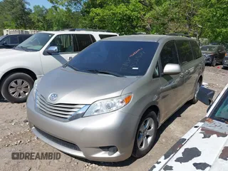 2015 Toyota Sienna LE AAS with VIN 5TDKK3DCXFS552524, listed as a IAAI auction lot 42060065 with 249,332 mi miles and . Bid and sale history available at DreamBid. Image 2.