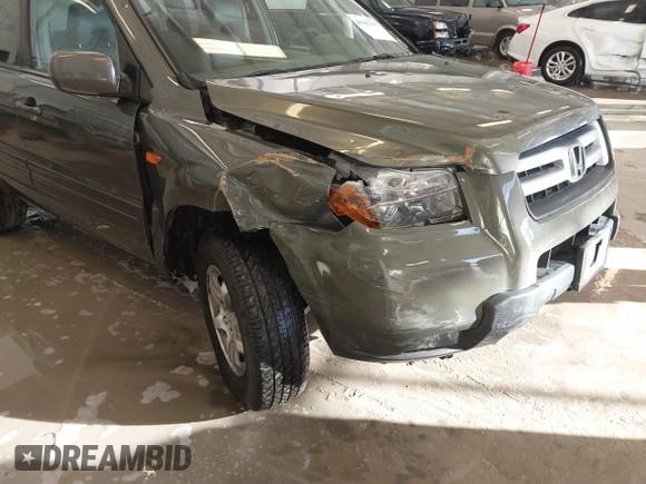 2006 Honda Pilot EX-L with VIN 5FNYF187X6B026463, listed as a IAAI auction lot 41612181 with 242,828 mi miles and . Bid and sale history available at DreamBid. Image 6.