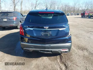 2021 Cadillac XT5 FWD Premium Luxury z VIN 1GYKNCRS2MZ141440, wystawiony jako IAAI lot #41874409 z przebiegiem 76 911 mil mil oraz . Historia ofert i sprzedaży dostępna na DreamBid. Obrazek 16.