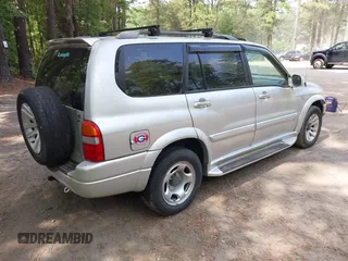 2002 Suzuki XL7 Standard z VIN JS3TX92V924105896, wystawiony jako IAAI lot #42869920 z przebiegiem 189 036 mil mil oraz . Historia ofert i sprzedaży dostępna na DreamBid. Obrazek 4.