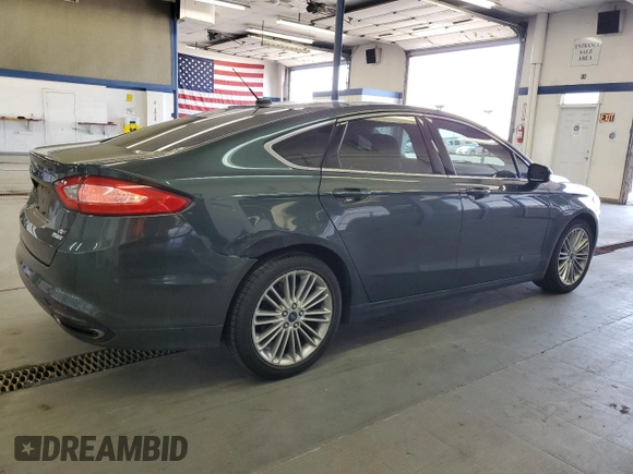 2015 Ford Fusion SE z VIN 3FA6P0H98FR295646, wystawiony jako Copart lot #57055105 z przebiegiem 121 515 mil mil oraz Szkoda całkowita • Salvage title. Historia ofert i sprzedaży dostępna na DreamBid. Obrazek 3.