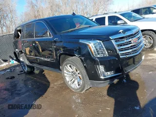 2017 Cadillac Escalade Platinum z VIN 1GYS4DKJ5HR223257, wystawiony jako IAAI lot #41650448 z przebiegiem 106 460 mil mil oraz . Historia ofert i sprzedaży dostępna na DreamBid. Obrazek 1.