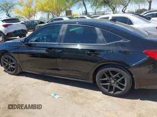 2022 Honda Civic Sport z VIN 2HGFE2F5XNH571381, wystawiony jako IAAI lot #42041589 z przebiegiem 37 667 mil mil oraz . Historia ofert i sprzedaży dostępna na DreamBid. Obrazek 15.