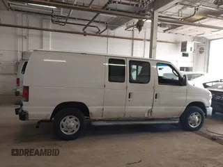 2013 Ford Econoline Cargo Commercial with VIN 1FTNE2EW0DDA16097, listed as a IAAI auction lot 42172617 with 369,619 mi miles and . Bid and sale history available at DreamBid. Image 13.